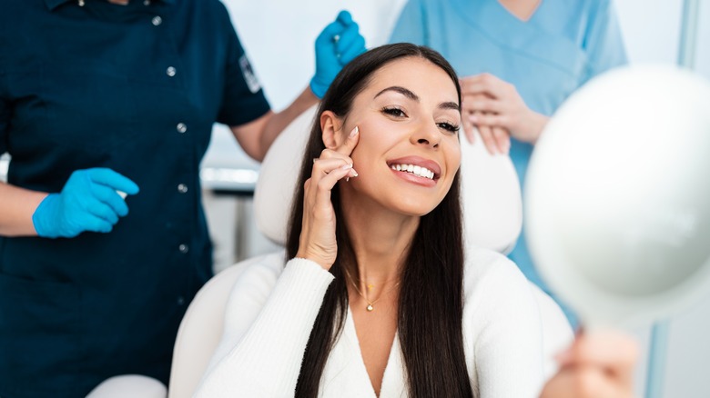 Woman smiling post-filler results