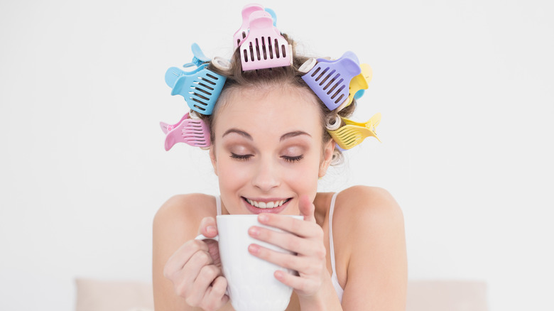 Woman with hair in rollers