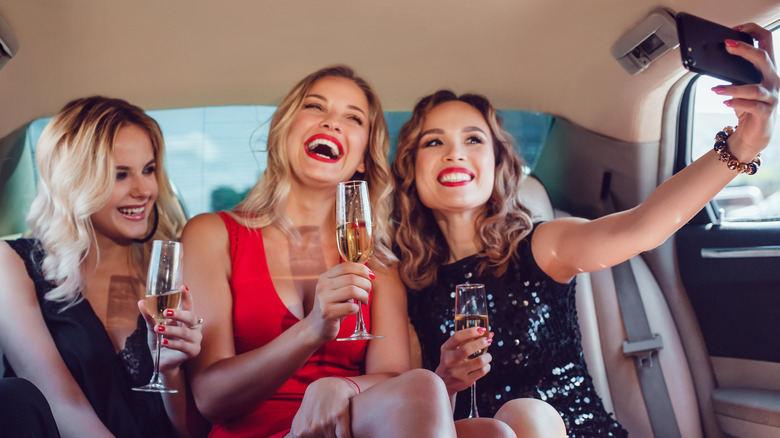 women drinking champagne