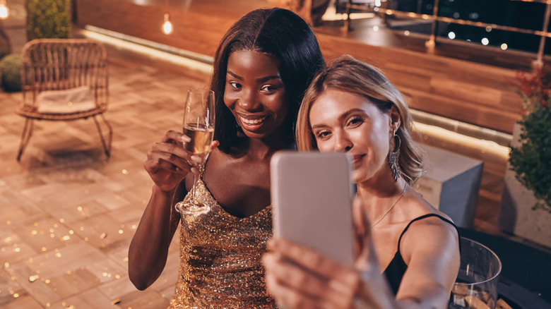 two women taking selfie