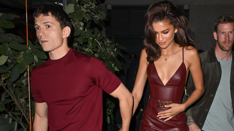 Zendaya and Tom Holland step out wearing matching shades of burgundy