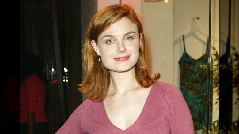 Emily Deschanel with copper hair on October 14, 2003