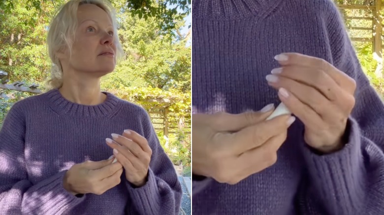 (L) Pamela Anderson wearing a purple sweater while applying a lip product; (R) Pamela Anderson's milky French manicure