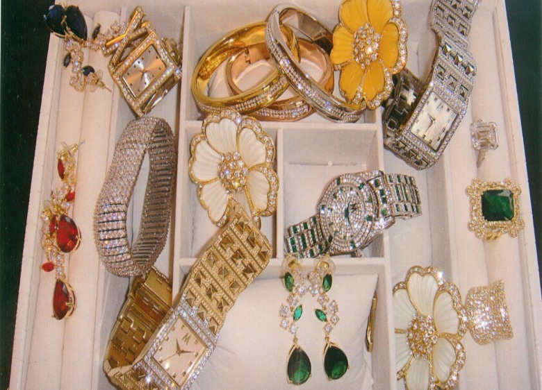 Pieces from Melania Trump's jewelry line sorted into a jewelry organizer