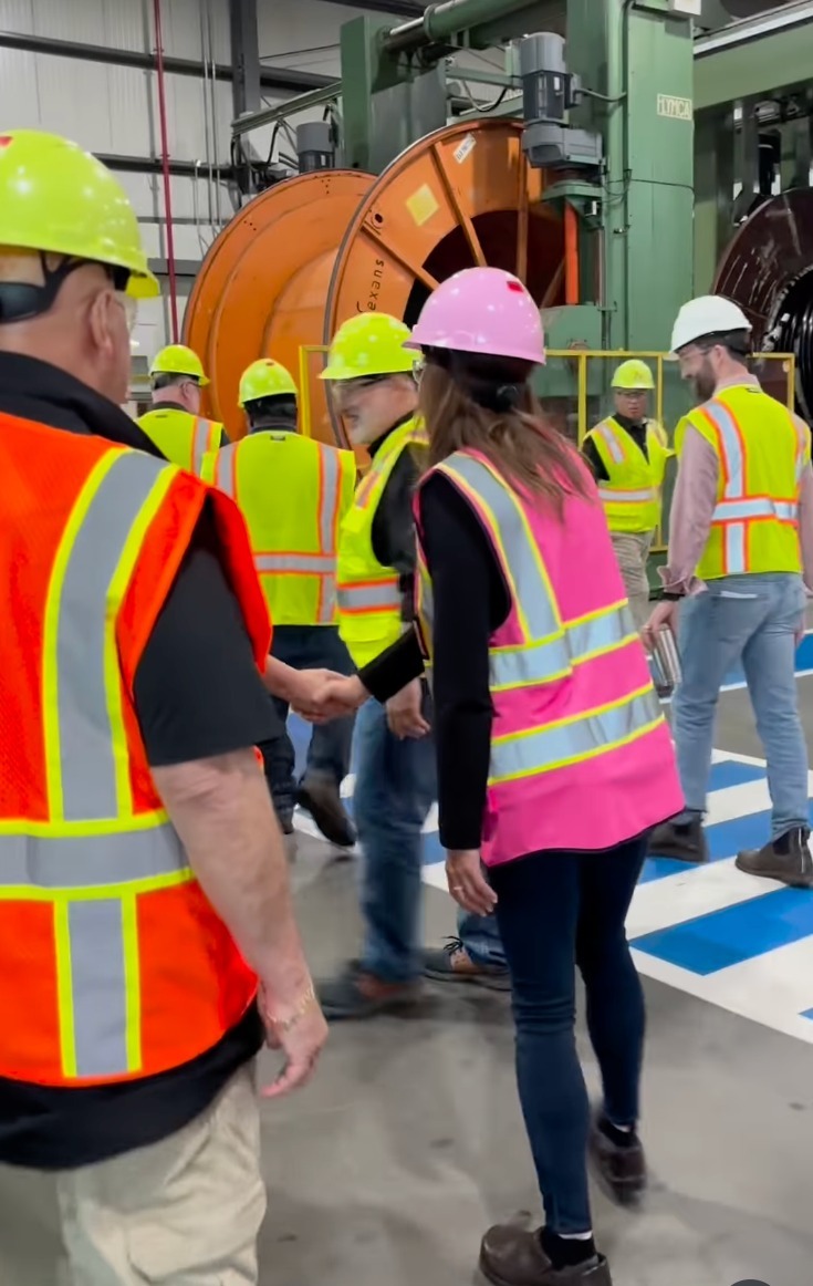 Nancy Mace wearing a pink hard hat and construction safety vest