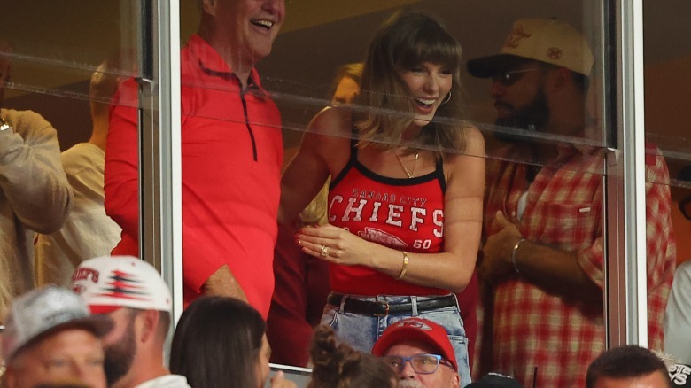 Taylor Swift wearing a sporty Chiefs top