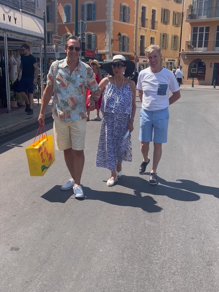 Joan Collins in an effortless maxi dress with zebra print while at a vacation resort with her husband