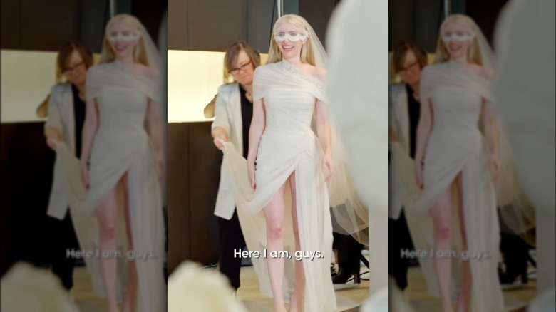 Emma Roberts showcases her wedding dress.