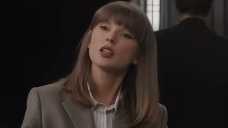 Taylor Swift wearing straight hair in a 2026 Emmys skit