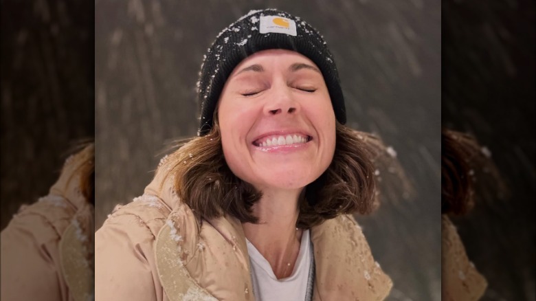 Nikki DeLoach smiling in the snow in February 2025.