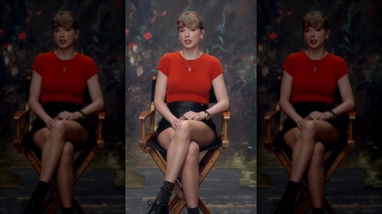 Taylor Swift wearing a leather miniskirt with a red T-shirt