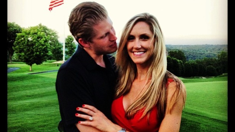 A younger Lara Trump being held by Eric Trump after becoming newly engaged