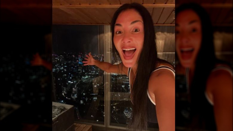 Nicole Scherzinger gesturing in a selfie