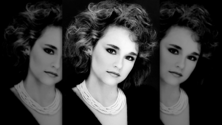 Diane Franklin with shorter hair.